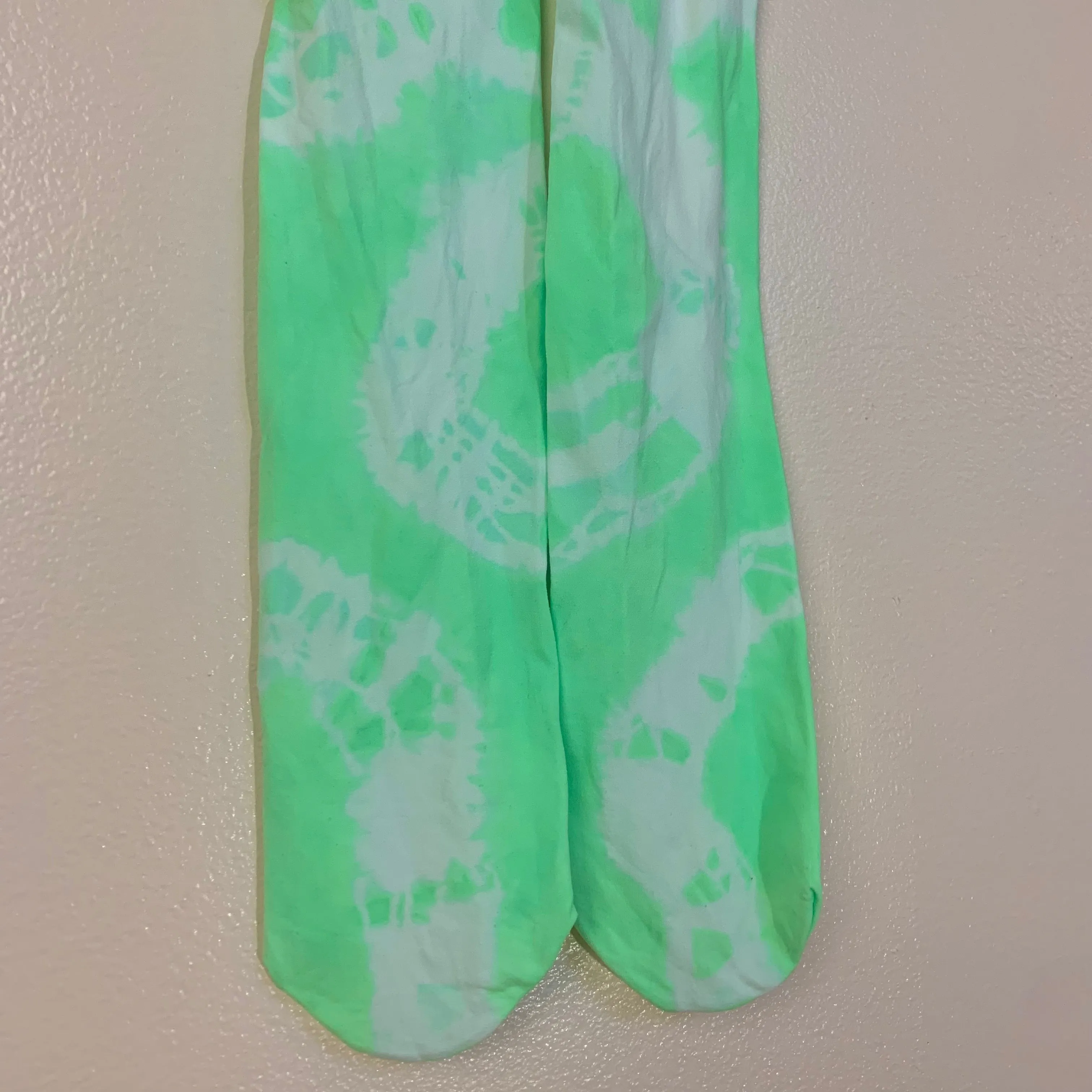 Acid green tie dye leggings.