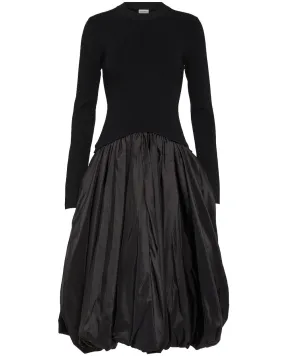 Black long sleeve dress with mock neck, midi length.