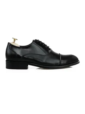 Black Oxford Cap Toe Lace Up shoe.