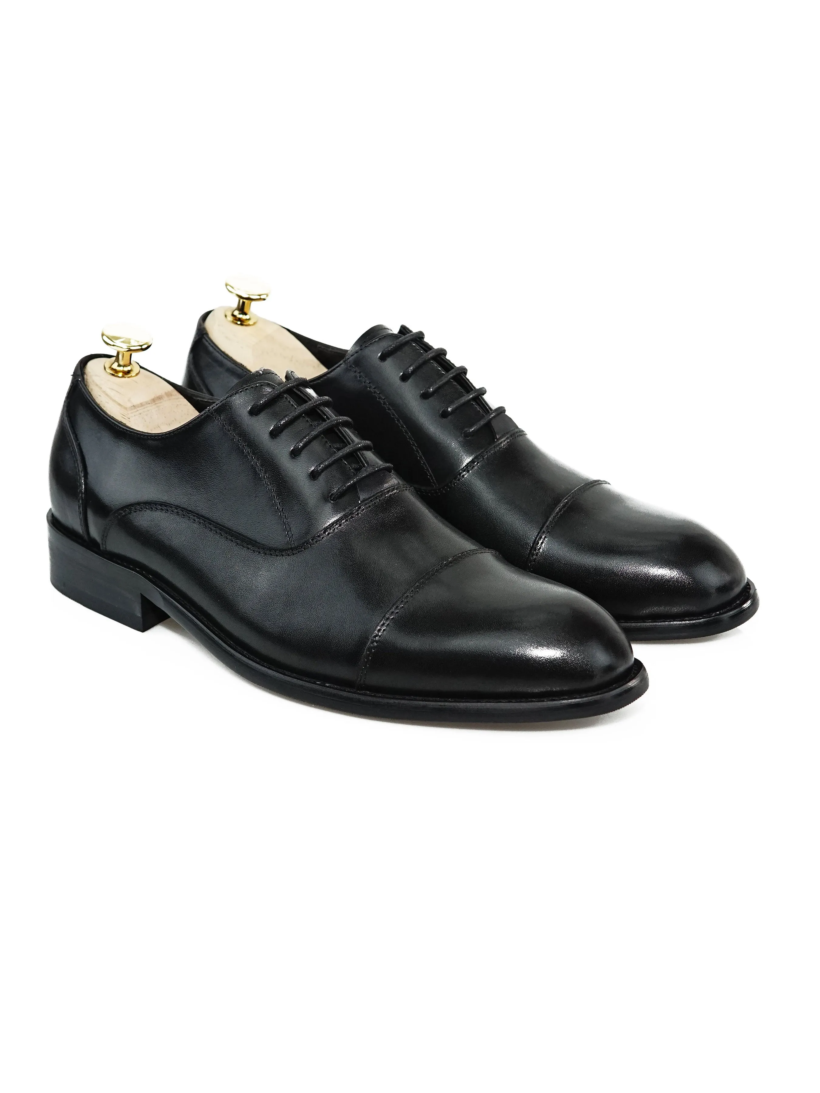 Black Oxford Cap Toe Lace Up shoe.