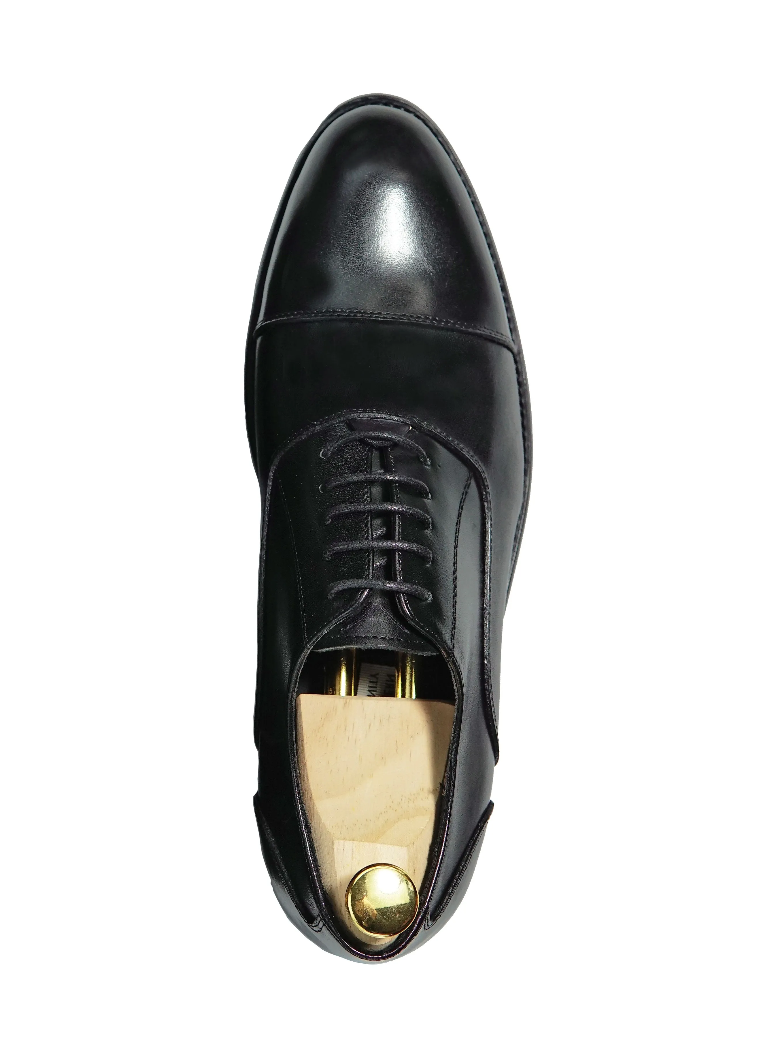 Black Oxford Cap Toe Lace Up shoe.