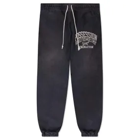 Black sweatpants with possession design