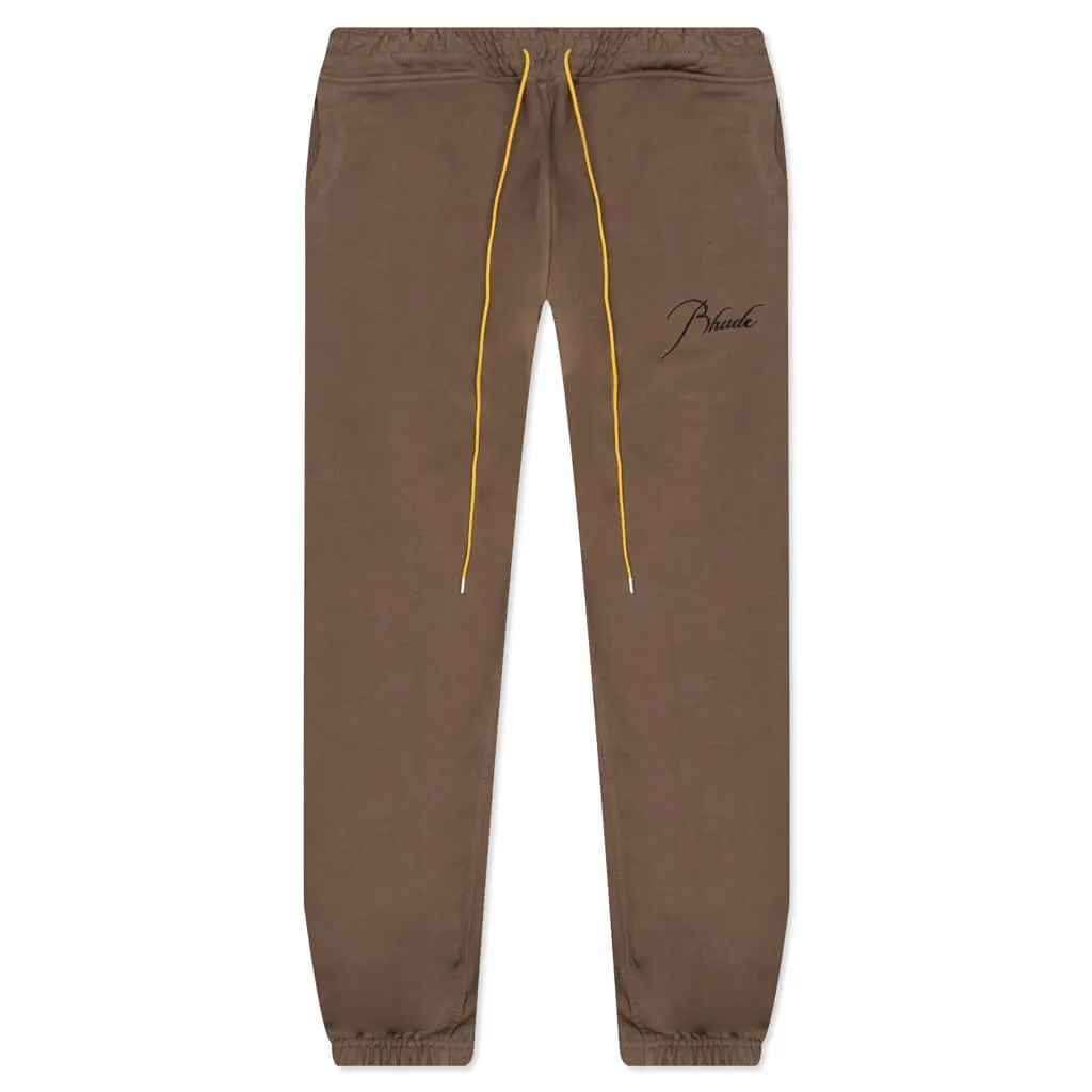 Brown and black sweatpants