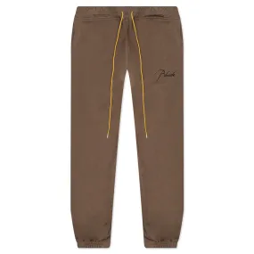 Brown and black sweatpants