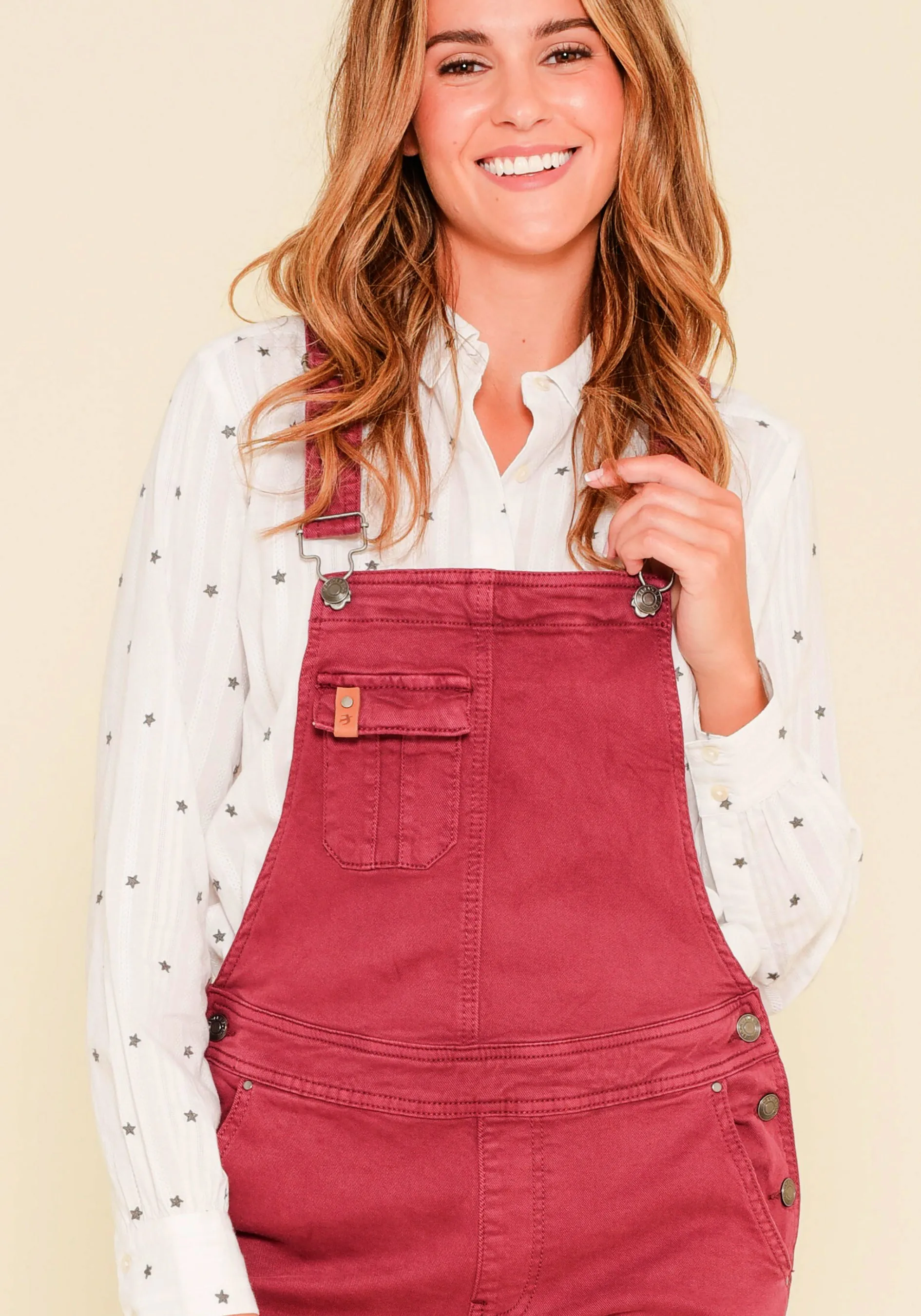 Denim overalls.