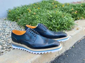 Wingtip Blucher Oxford with lightweight sole.